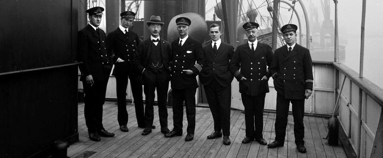 Crew members on the deck of a ship